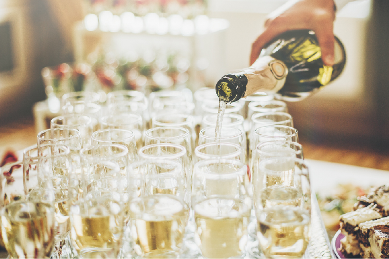 Image of drinks being poured for a champagne reception